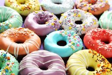 depositphotos_151053428-stock-photo-tasty-donuts-with-sprinkles.jpg