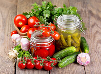 2019Food_Canned_tomatoes_and_cucumbers_on_the_table_with_fresh_vegetables_and_greens_131206_.jpg