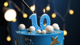 birthday-cake-number-10-stars-sky-moon-concept-blue-candle-is-fire-by-lighter-copy-space-right...jpg